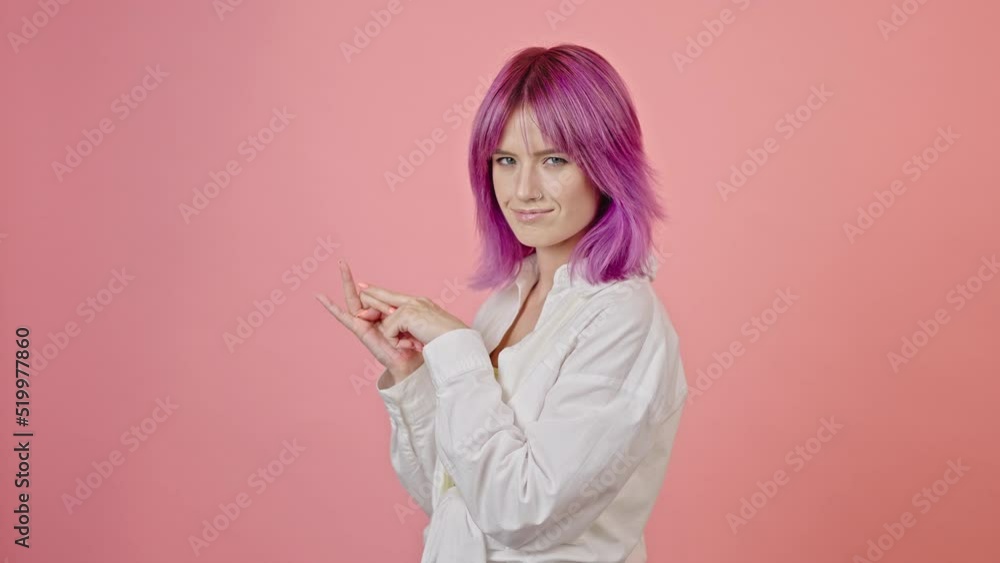 Young woman enumerates things and looks happy closeup Young woman enumerates things and looks happy closeup