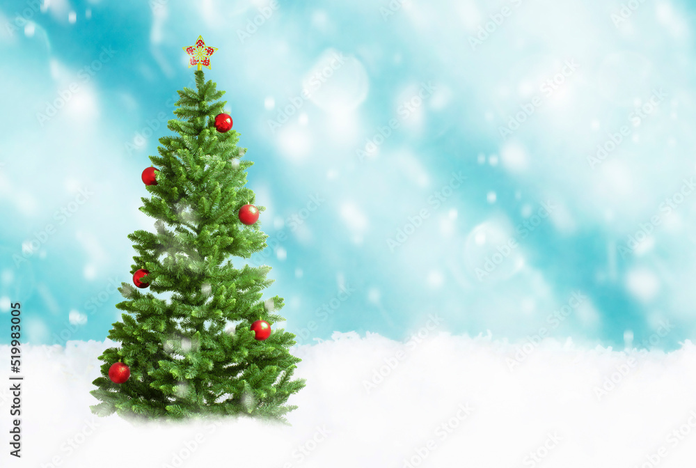 Christmas tree on a blue background with falling snow
