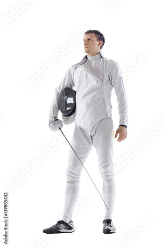 Portrait of professional male fencer in fencing costume and mask holding smallsword isolated on white background. Sport, emotions, energy, skills