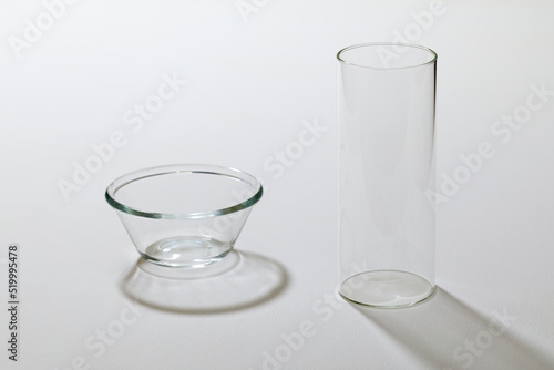 Straight glass and glass bowl on the white background.