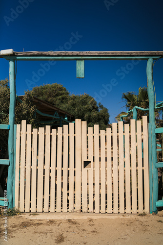 Puertade madera en chiringuito de playa cerrado photo