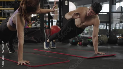 Wallpaper Mural Asian woman doing push-ups with boyfriend in sports club, gym fitness training center, indoor workout, athletic. Torontodigital.ca