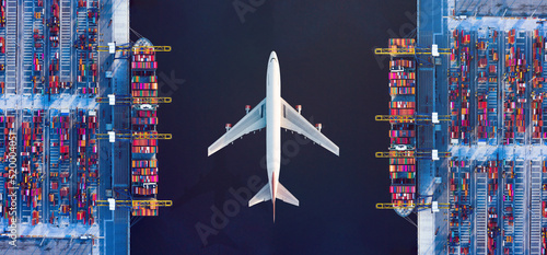 Photography Aerial top view of Container ship loading and unloading at cargo shipping port, Cargo container in deep seaport for the international order concept