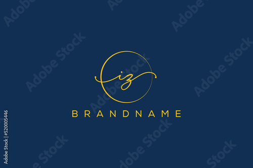 IZ   I Z hand drawn logo of initial signature, fashion, jewelry, photography, boutique, script, wedding, floral and botanical creative vector logo template for any company or business.