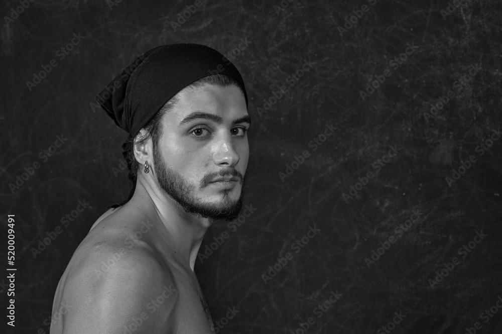 Portrait of a young man with a beard