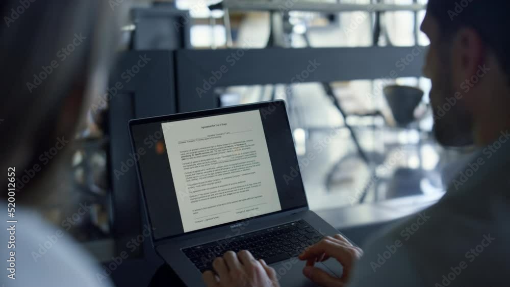 Man typing laptop screen with text office closeup. Coworkers signing contract Man typing laptop screen with text office closeup. Coworkers signing contract