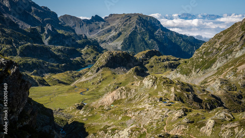 View from La Pra pass with longet lake in the background, Belledonne Moutains, Alpes, France photo