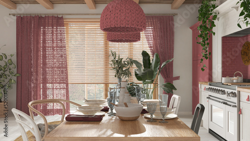 Wooden country dining table setting in white and red tones. Kitchen, pendant lamps and window. Scandinavian boho interior design