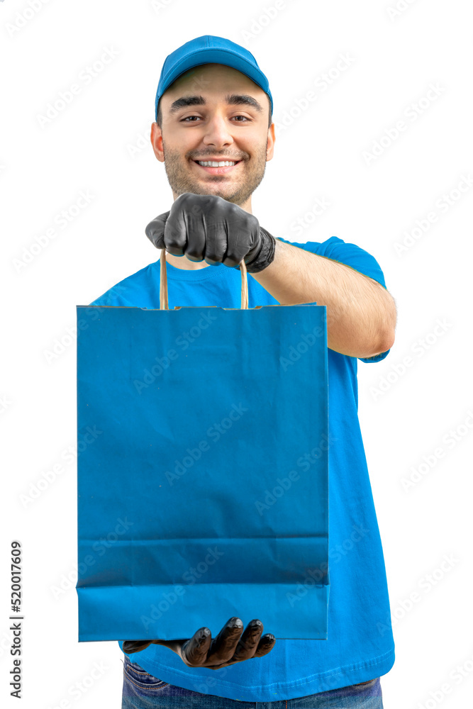 Delivery man with paper bag. Courier in uniform cap and t-shirt, gloves service fast delivering orders. Young guy holding a cardboard package. Character on isolated white background for mockup design Delivery man with paper bag. Courier in uniform cap and t-shirt, gloves service fast delivering orders. Young guy holding a cardboard package. Character on isolated white background for mockup design
