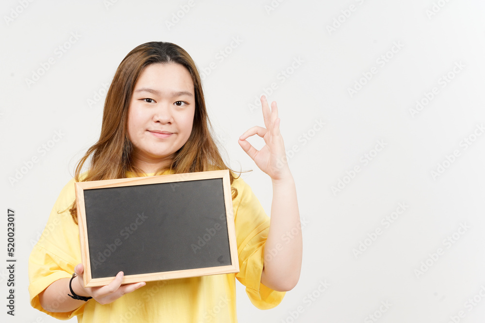 Showing, Presenting and holding Blank Blackboard of Beautiful Asian Woman wearing yellow T-Shirt Showing, Presenting and holding Blank Blackboard of Beautiful Asian Woman wearing yellow T-Shirt