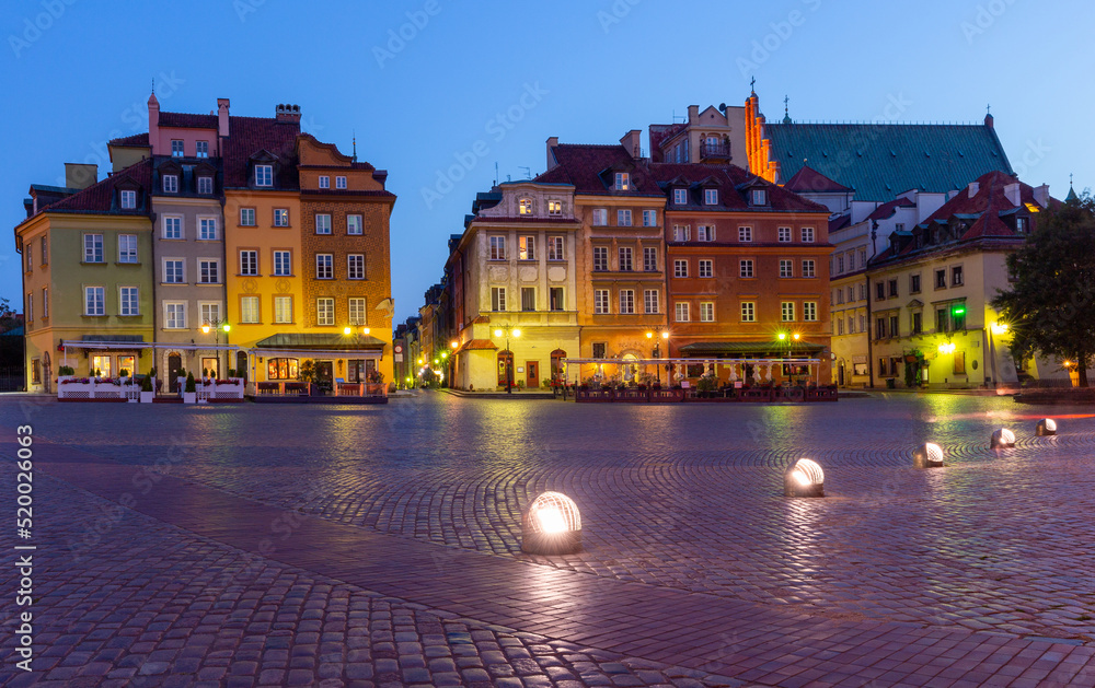 Warsaw. Castle Square in the night illumination at dawn.