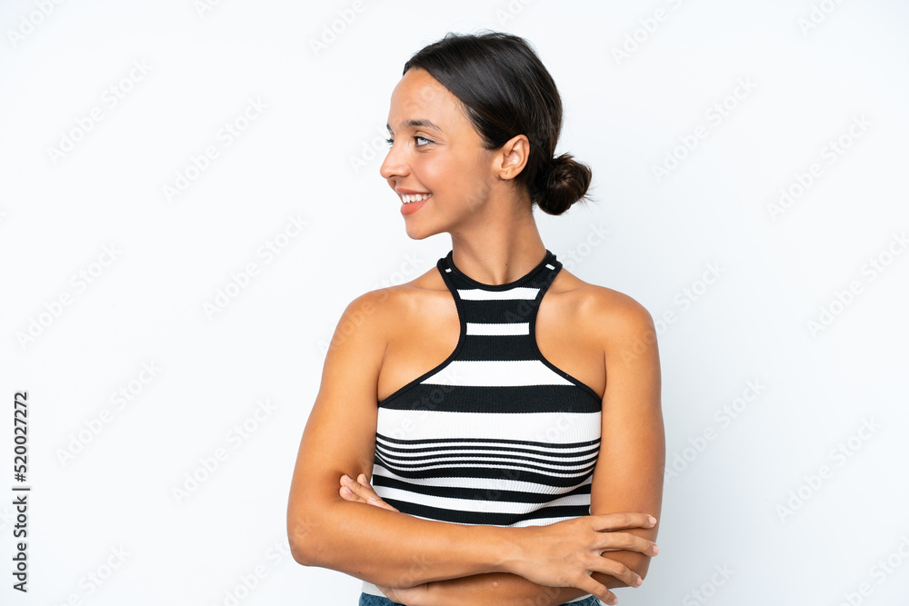 Young hispanic woman isolated on white background looking to the side and smiling Young hispanic woman isolated on white background looking to the side and smiling