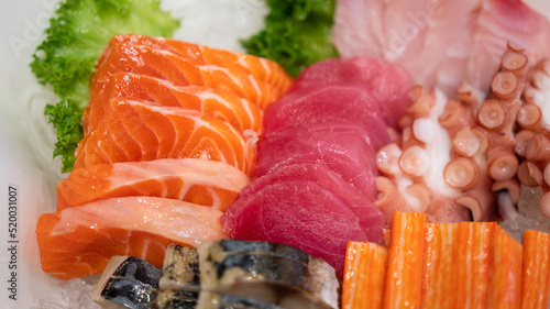 Set of premium sashimi meat, various kind of sliced raw fish meat such as salmon, tuna and snapper. Japanese food object photo.
