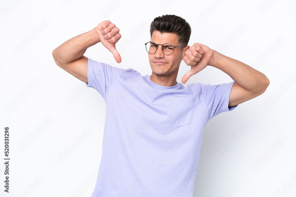 Fototapeta premium Young caucasian man isolated on white background proud and self-satisfied