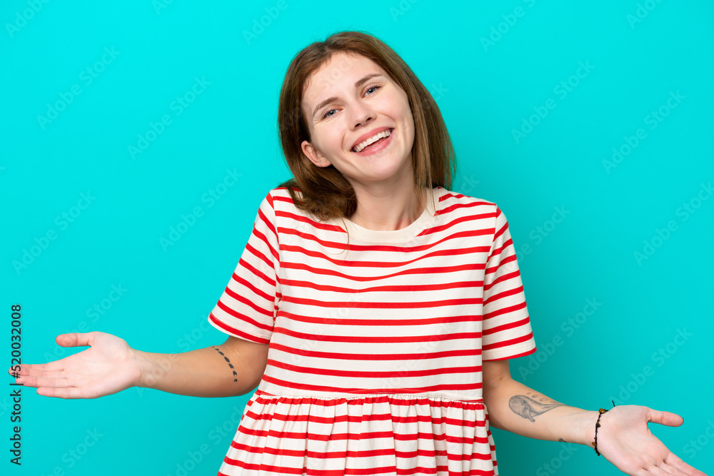 Young English woman isolated on blue background happy and smiling Young English woman isolated on blue background happy and smiling