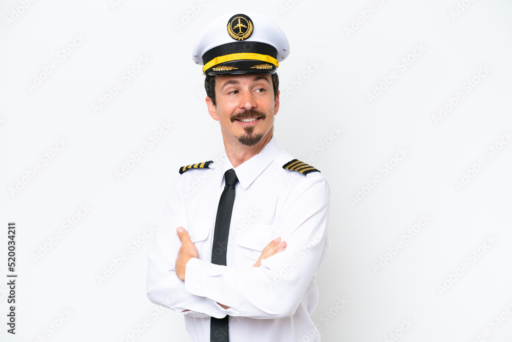 Airplane caucasian pilot isolated on white background with arms crossed and happy