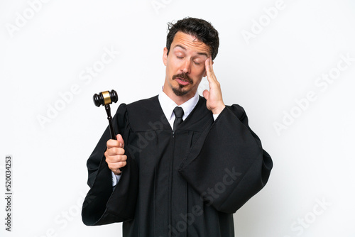 Young judge caucasian man isolated on white background with headache