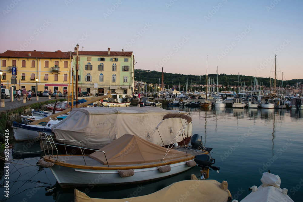 Dusk at the waterfront of the historic medieval town of Izola on the Adriatic coast of Slovenia
