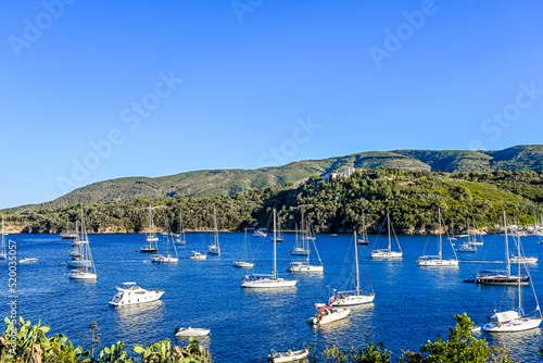 Porto Azzurro, Marina di Capoliveri, Baia di Mola, Bucht, Hafen, Küste, Segelschiffe, Motorboote, Elba, Insel, Sommer, Italien, Toskana, Toskanischer Archipel, Abendstimmung photo