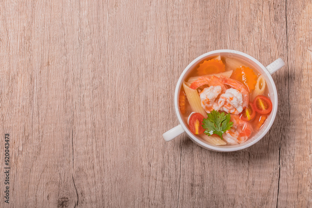 Shrimp and Vegetable Macaroni Soup in White Bowl Shrimp and Vegetable Macaroni Soup in White Bowl