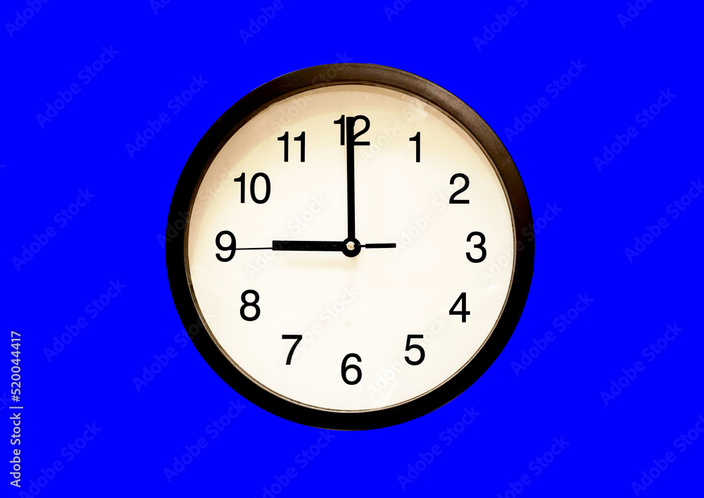 Classic black and white analog clock blue background Classic black and white analog clock blue background