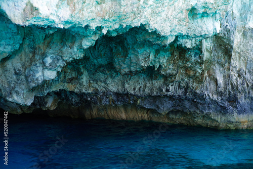 entrance to cave in water for diving and underwater sports, exploration of blue caves in zakynthos greek island