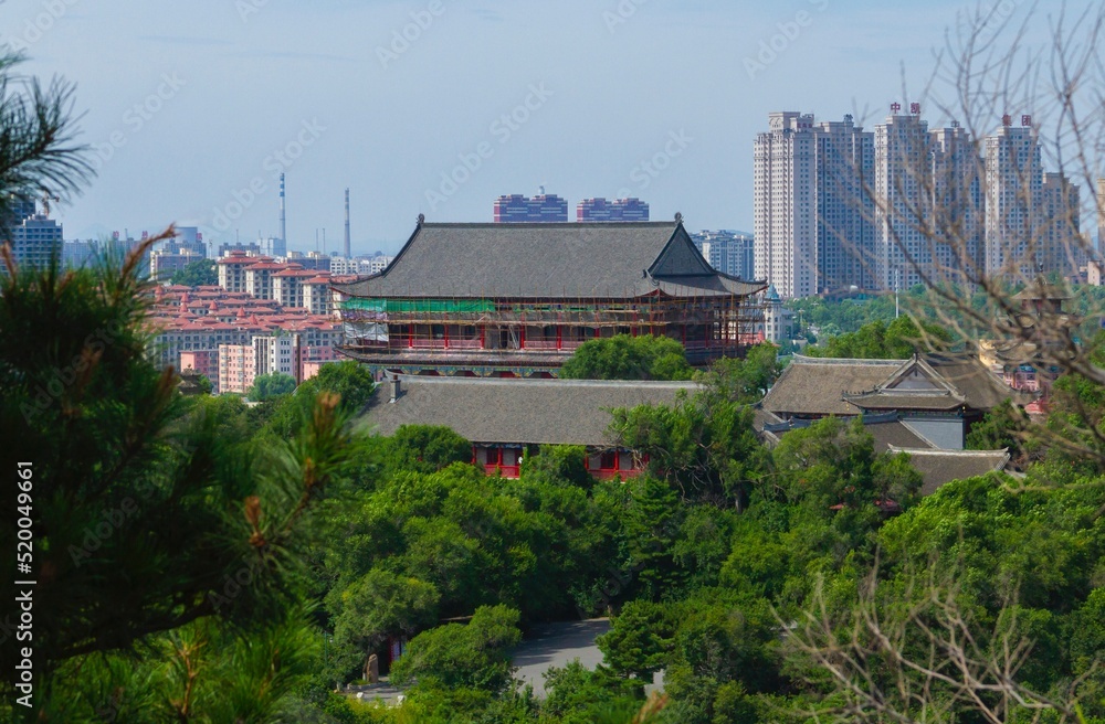 Jilin, Jilin, China - June 21 2021: An old Chinese traditional architecture building in a city.