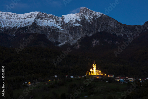 Basilic of Dreznica Under mount Krn illuminated in Evening Hours - Kobarid, Slovenia
