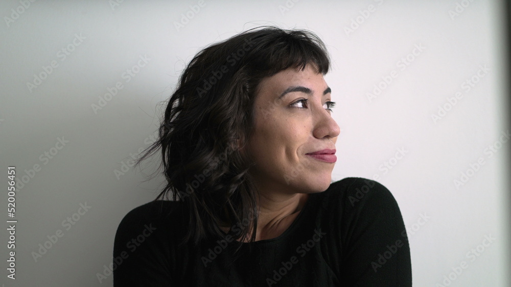 One happy delighted female hispanic young woman smiling. Portrait face closeup of positive latin girl One happy delighted female hispanic young woman smiling. Portrait face closeup of positive latin girl