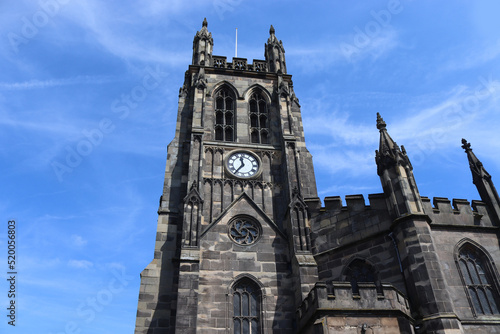 Exterior view of St.Mary's parish church in Stockport, Greater Manchester, England. Overlooking the market place this Grade 1 listed building is an active Anglican Parish Church. Copy space to left.