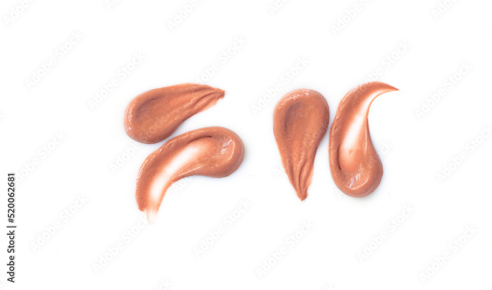 Tone cream or foundation, concealer smear stroke smudge isolated on white Tone cream or foundation, concealer smear stroke smudge isolated on white