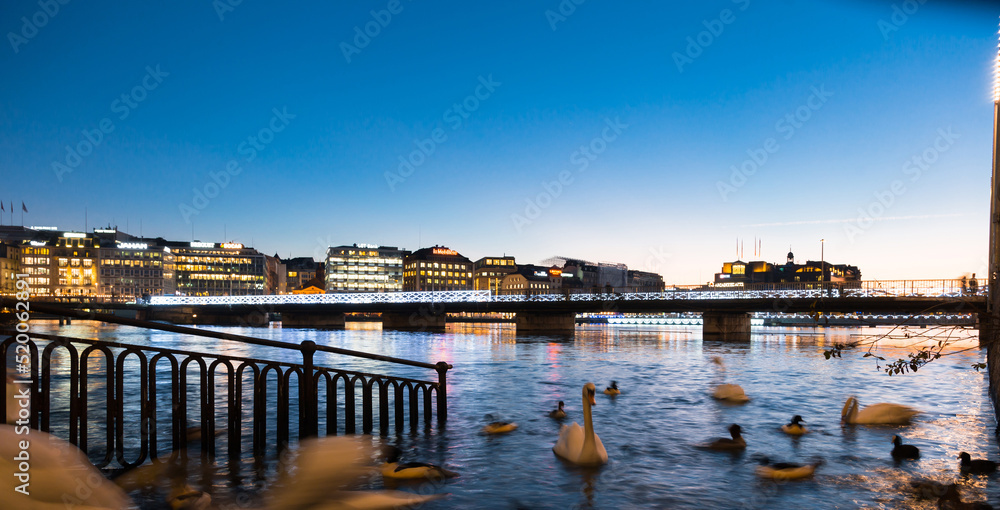 Sunset over Geneva. Embankment of leman River