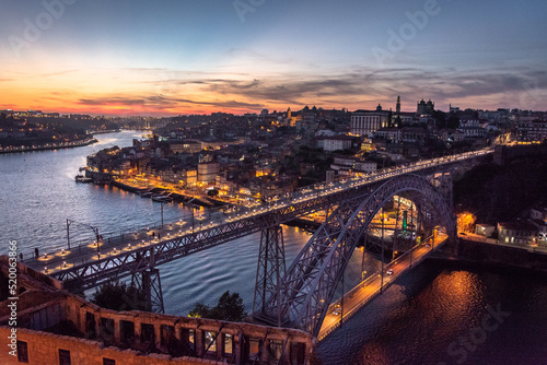 Porto, Portugal cityscape over the Douro River and Dom Louis Bridge.