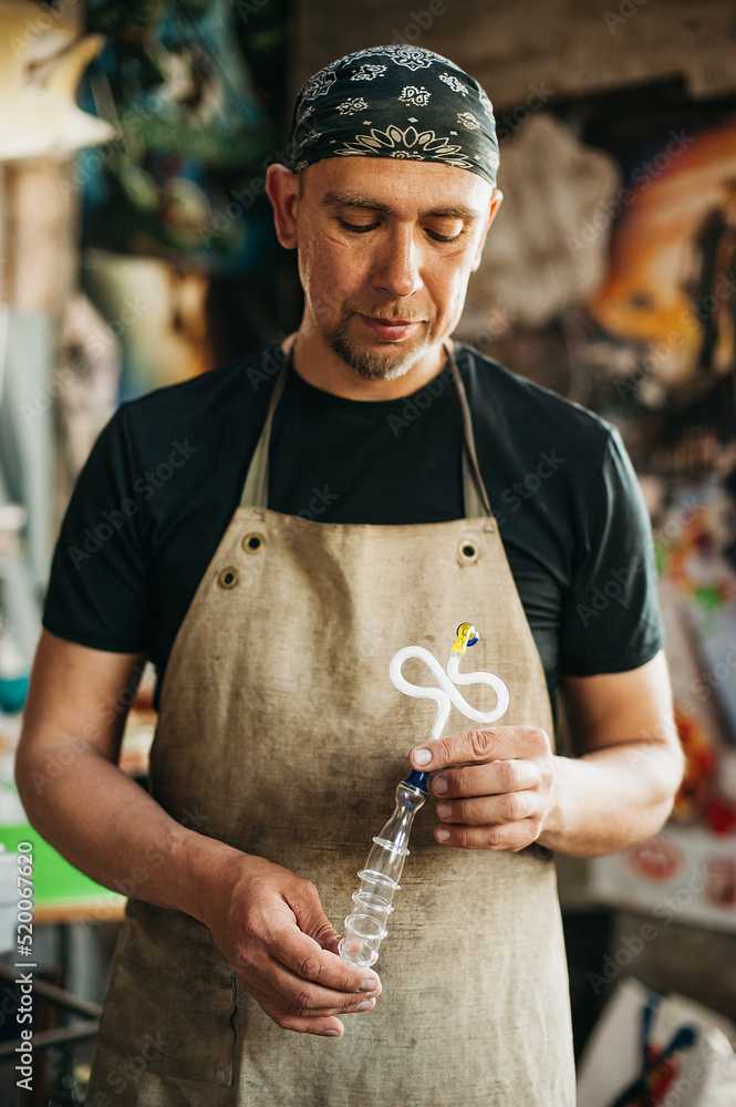 Glassblowing Burner with ready glass product. Production of