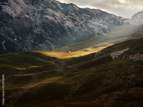 Amazing sunset in the Durmitor mountains. Sunlit mountain slopes. Durmitor national park in Montenegro