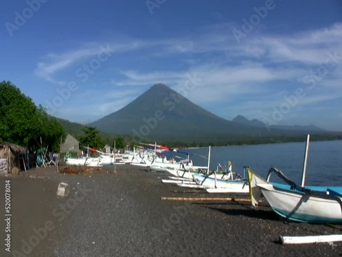 View of the Agung volcano from the beach in Amed, Bali photo
