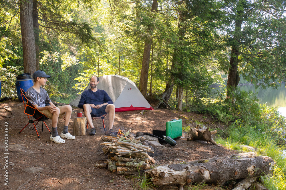 Fototapeta premium Father and son canoe trip