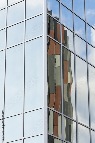 Detail of modern architecture buildings. Symbol of real estate, business, prosperity. Beautiful sunny day.