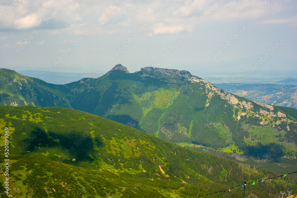 Naklejka premium Beautiful view of the Tatra Mountains landscape. View of the mountains from the top. High mountain landscape.