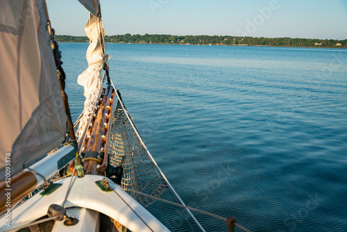 Sails folded and lashed to the bow on the Atalntic Ocean in Maine