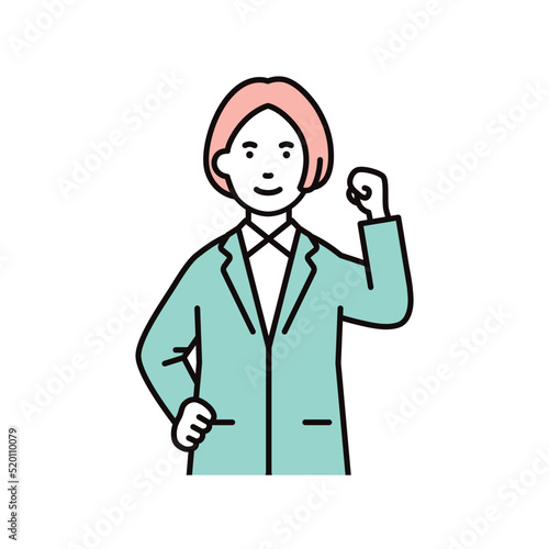 ビジネス_人物_女性_スーツ_上半身_腰に手をあて拳を上げる_左手