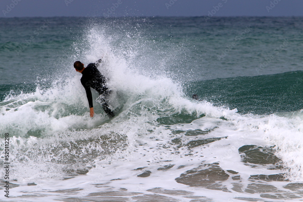 Surfing on high waves in the Mediterranean. Surfing on high waves in the Mediterranean.
