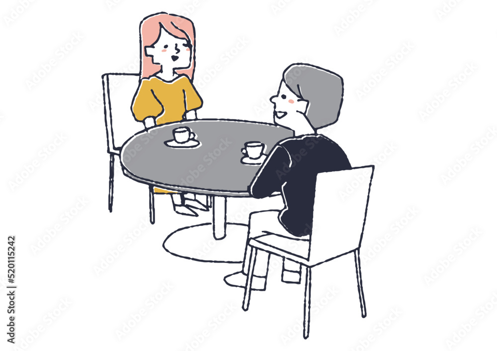 テーブルに座り会話をするカップル　喫茶店やカフェでの風景