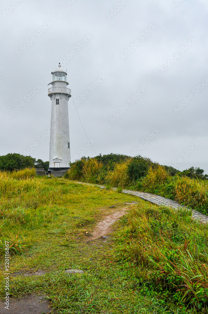 Shell Lighthouse in a rainy day in Ilha do Mel (Honey Island), Paraná, Brazil