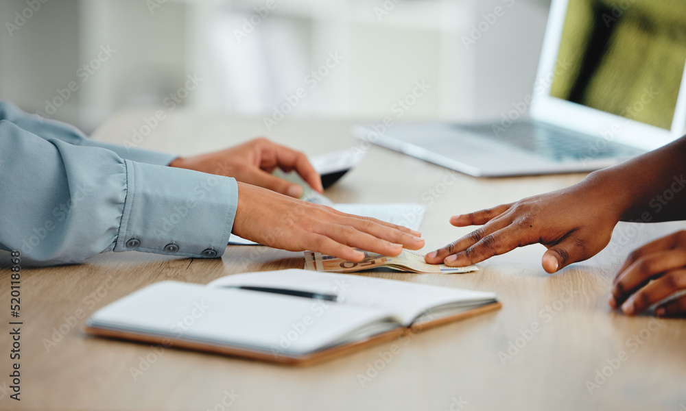 Closeup of money and payments paid between a customer and business owner on a table or desk. Client buying, shopping or using cash to pay a lawyer, agent or worker for a professional job service Closeup of money and payments paid between a customer and business owner on a table or desk. Client buying, shopping or using cash to pay a lawyer, agent or worker for a professional job service
