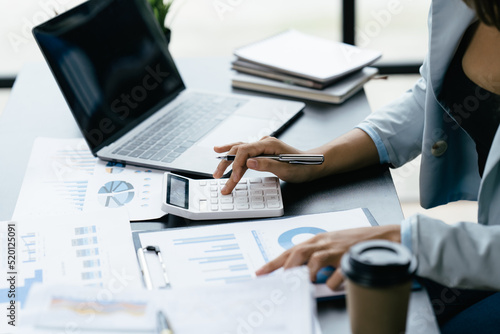 Businessman analysis marketing plan, Accountant calculate financial report, Accounting Calculating Cost Economic Financial data.