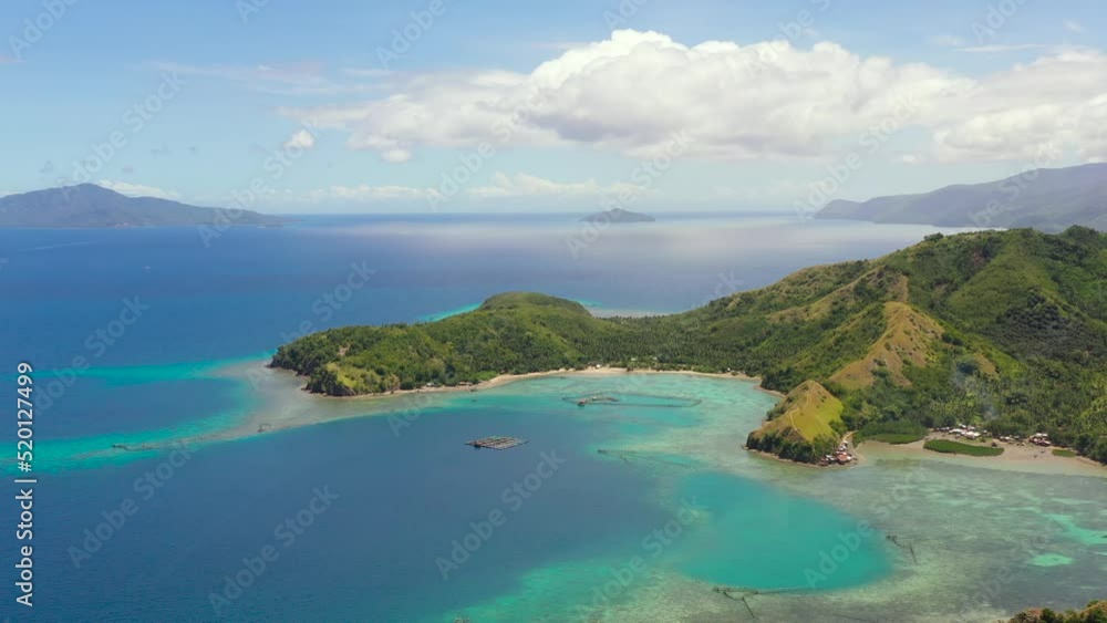 Seascape with tropical islands and turquoise water. Sleeping dinosaur island located on the island of Mindanao, Philippines. Seascape with tropical islands and turquoise water. Sleeping dinosaur island located on the island of Mindanao, Philippines.