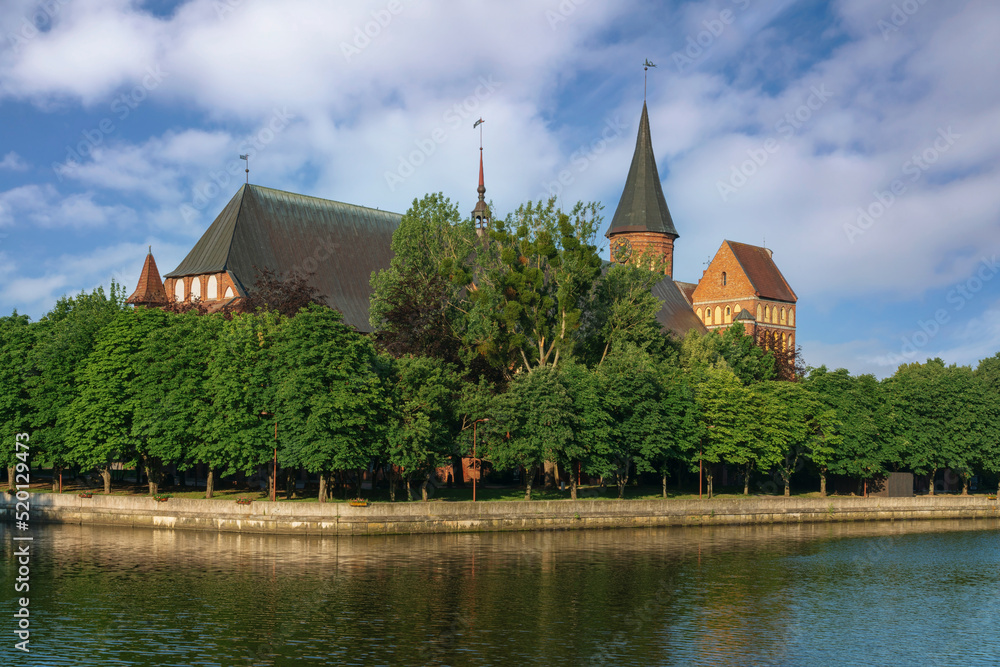 View of the Koningberg Cathedral on Immanuel Kant Island and the Pregolya River on a sunny summer day, Kaliningrad, Russia