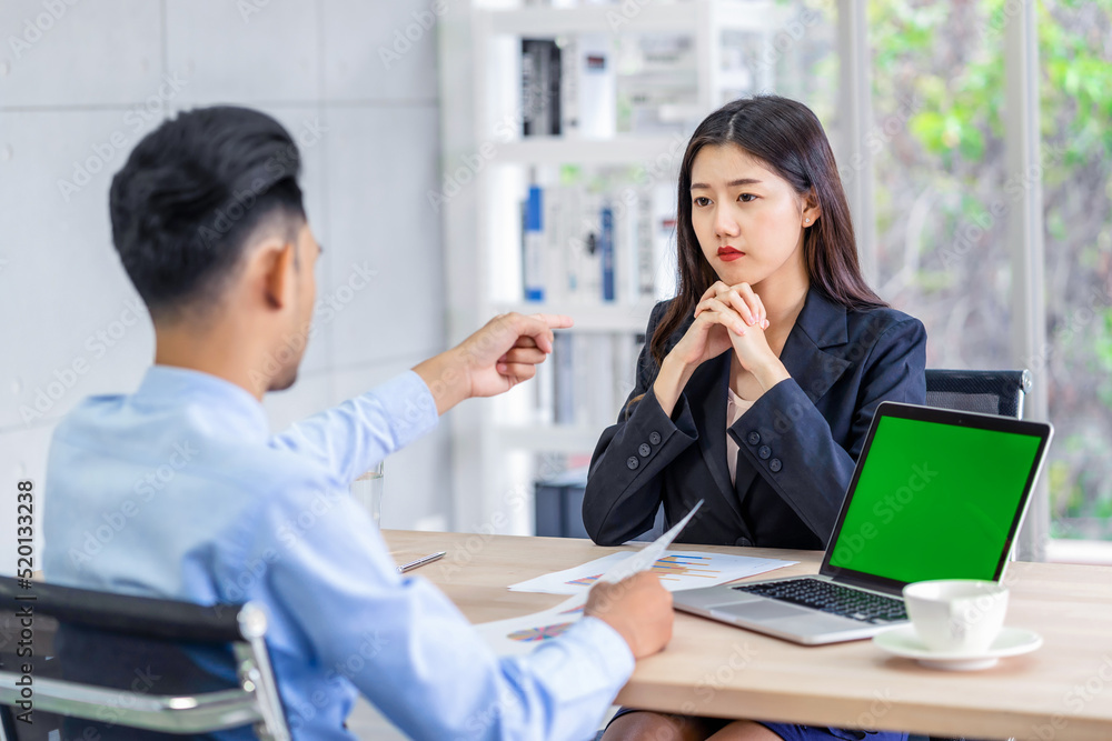 Scene of Furious boss scolding asian young couple businesswoman in formal suit by point to her face in modern office, Business mistake and punish concept
