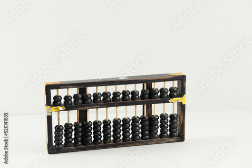 Vintage Abacus, Swipoa or Sempoa made from Wooden. Traditional Chinese Calculator photo